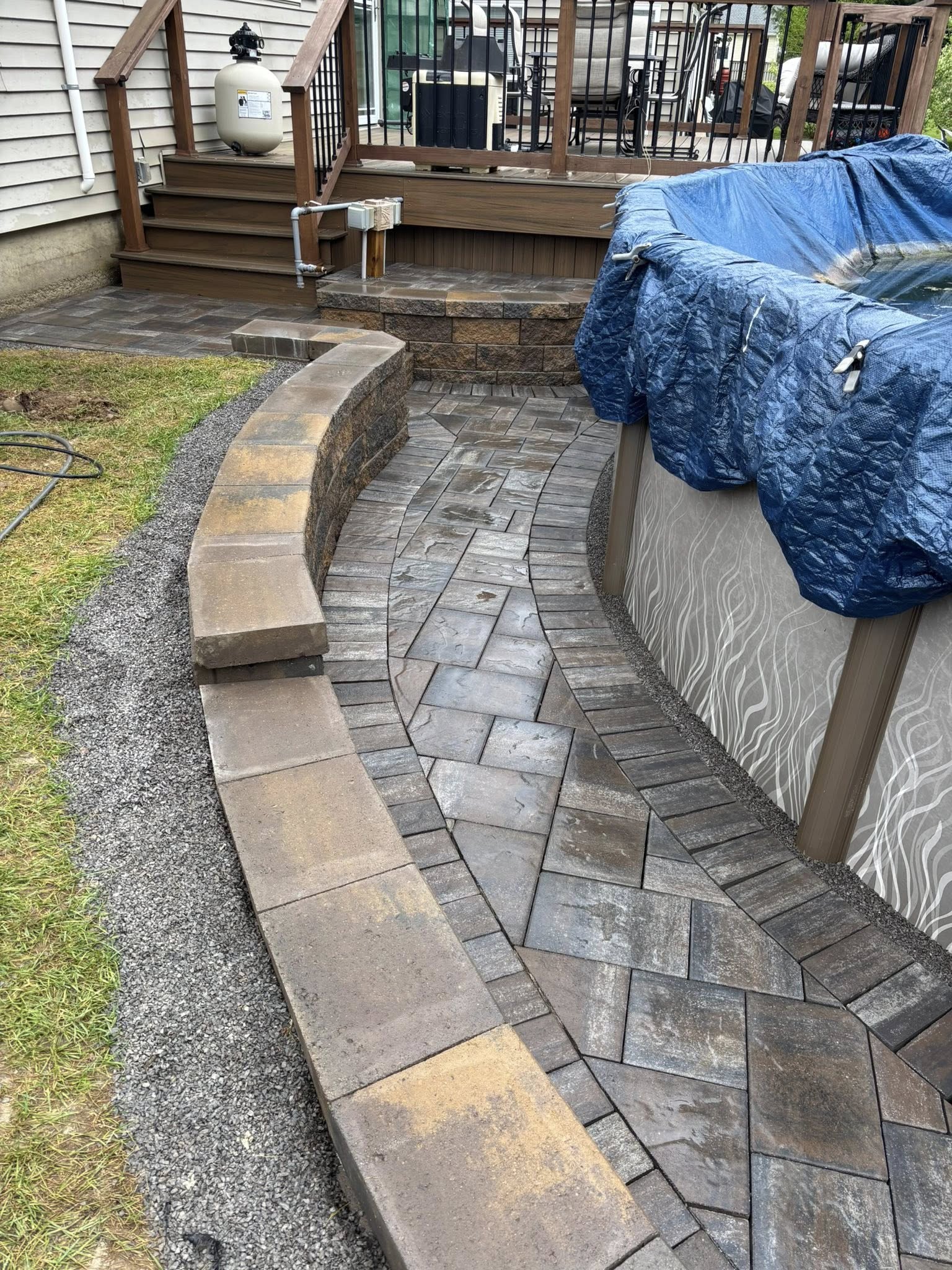 Curved Pool Surround with Retaining Wall